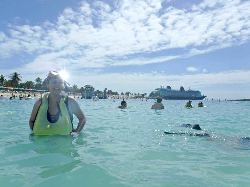 A woman snorkles at Disney's Castaway Cay, one of the many excursions you can do at Castaway Cay for adults. 