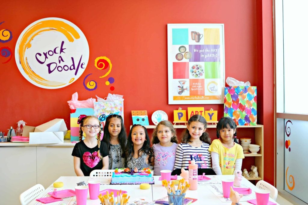 A group of girls at birthday party at Crock A Doodle. 