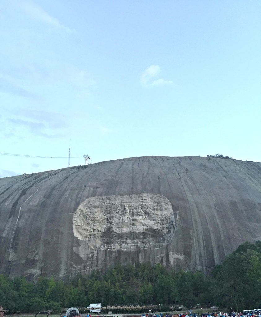 A front view of Stone Mountain and the mural carved into the side. 