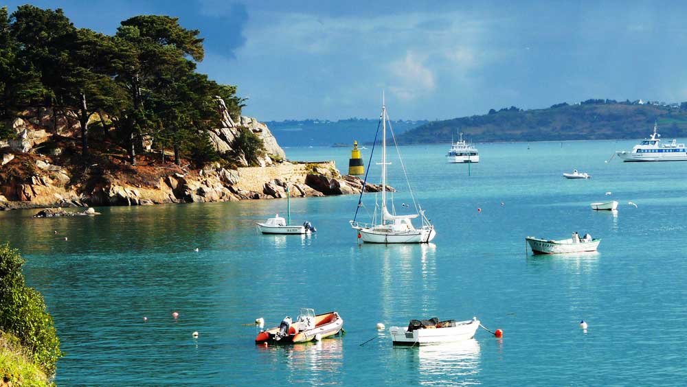 A sail boat is shown in the Ile de Brehat.