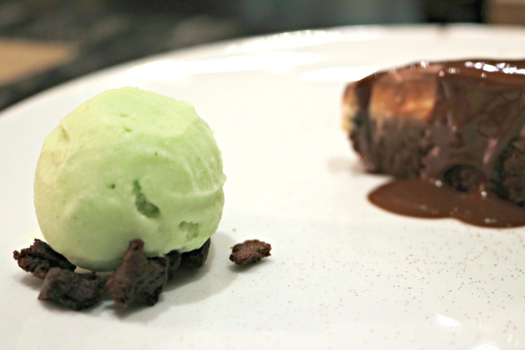 Honey dew and mint sorbet on gluten-free brownie served with a chocolate gluten-free cheesecake.