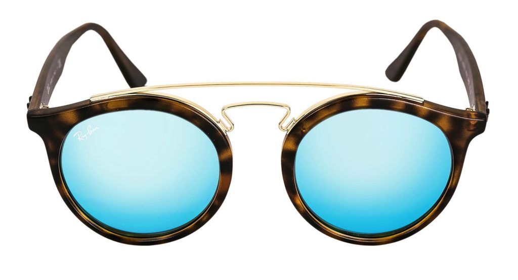 A pair of tortoise Ray-Ban sunglasses with blue lenses. One of many gifts for that special someone.