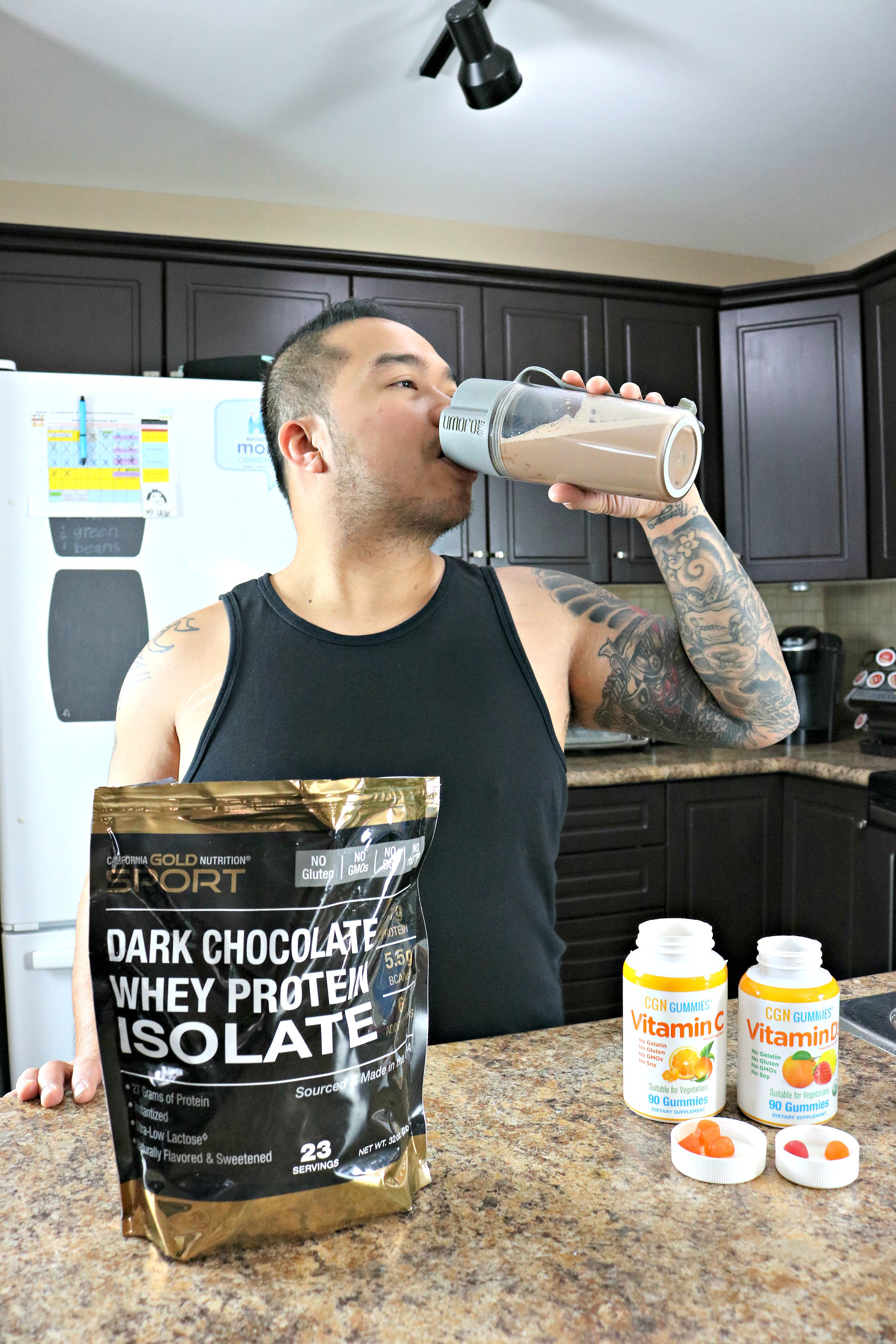 Man drinking Dark Chocolate Whey Protein Isolate. 