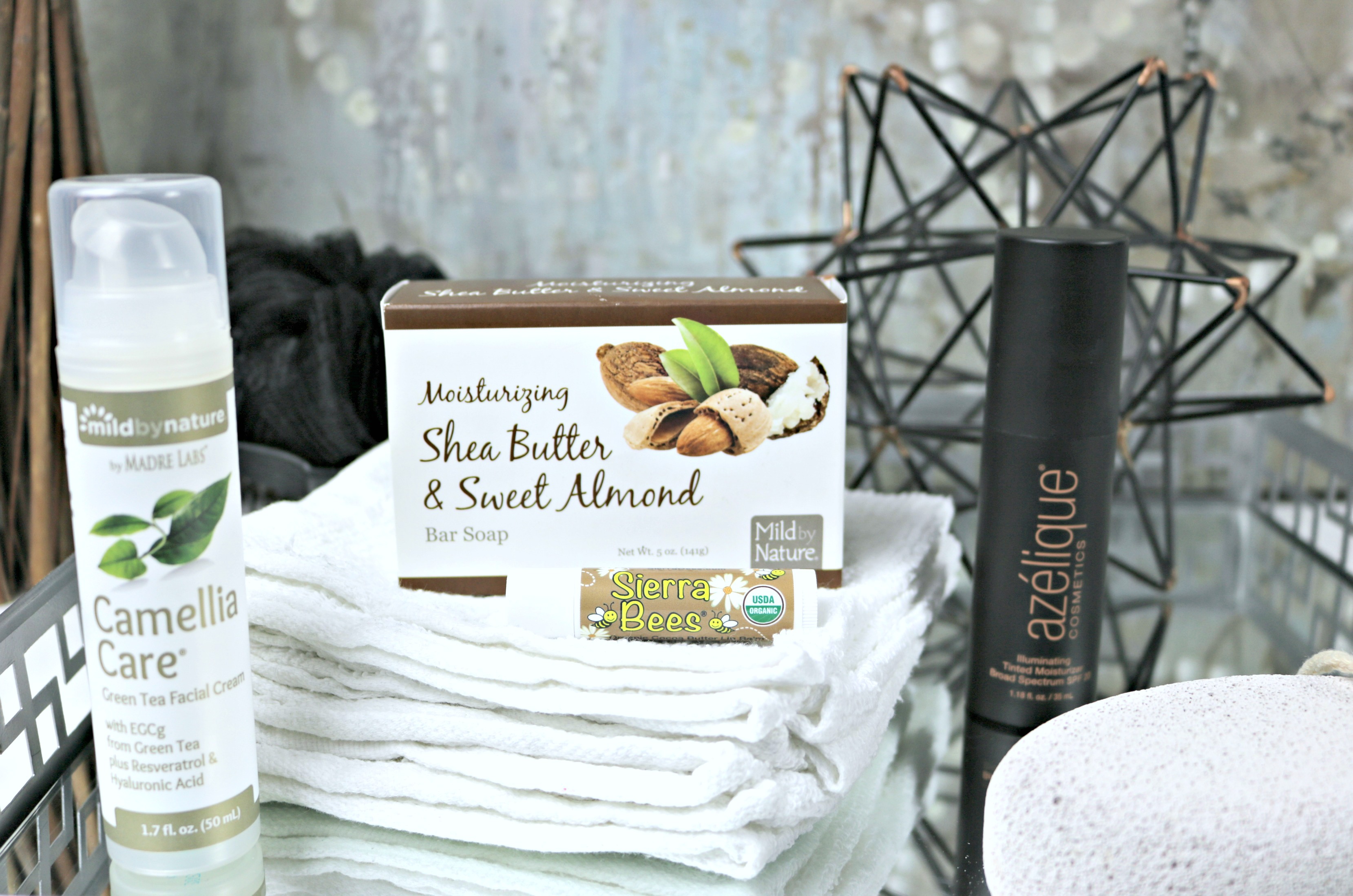Moisturizing Shea Butter & Sweet Almond soap by Mild by Nature with other skin essentials.