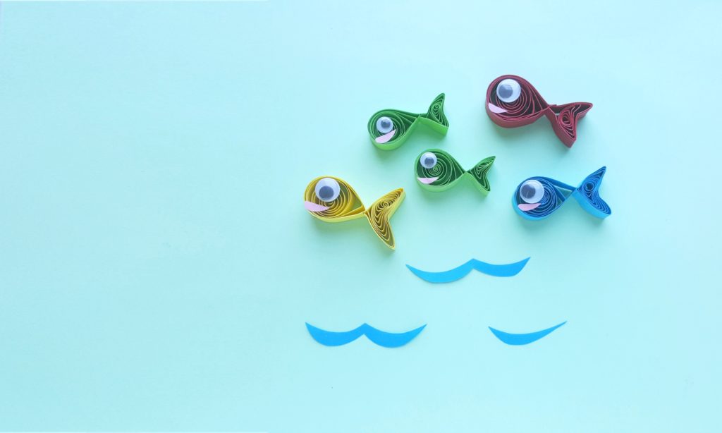 Quilled fish in yellow, gree, blue and red. Inspired by Dr. Seuss One Fish, Two fish, Red Fish, Blue Fish.