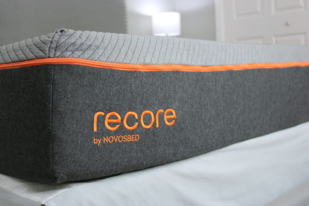 The Recore by Novosbed mattress, the liner is light and dark grey with orange details.