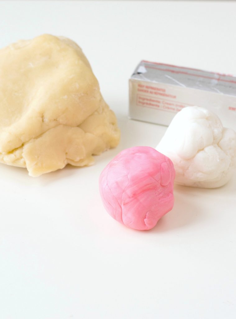 Sugar cookie dough, butter, and pink and white fondant are the ingredients needed. 