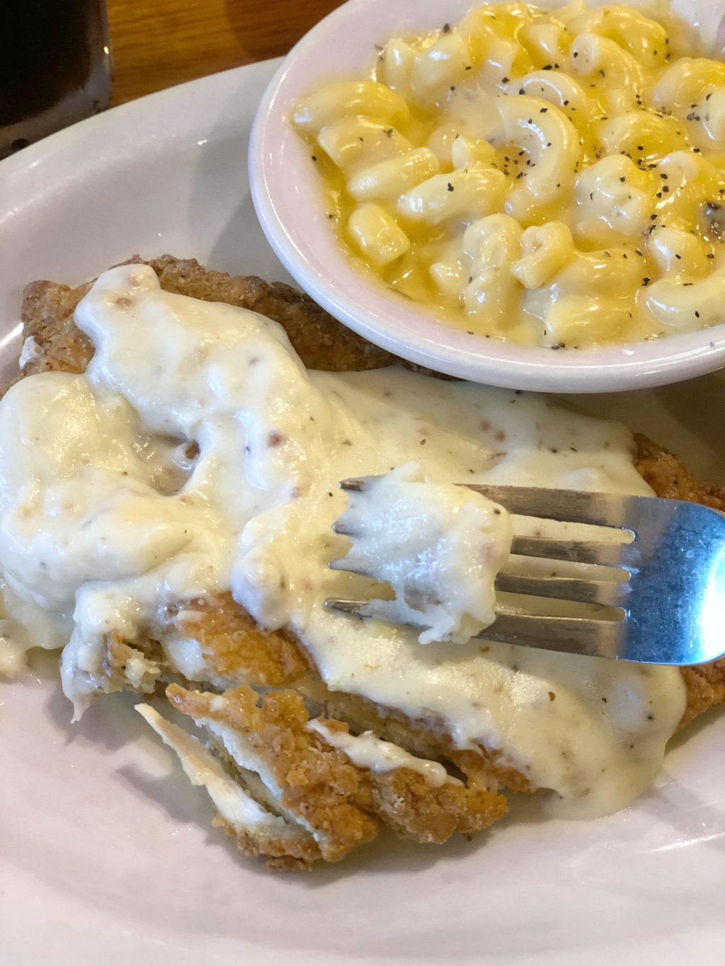 Southern Fried Chicken with mac and cheese and white gravy.