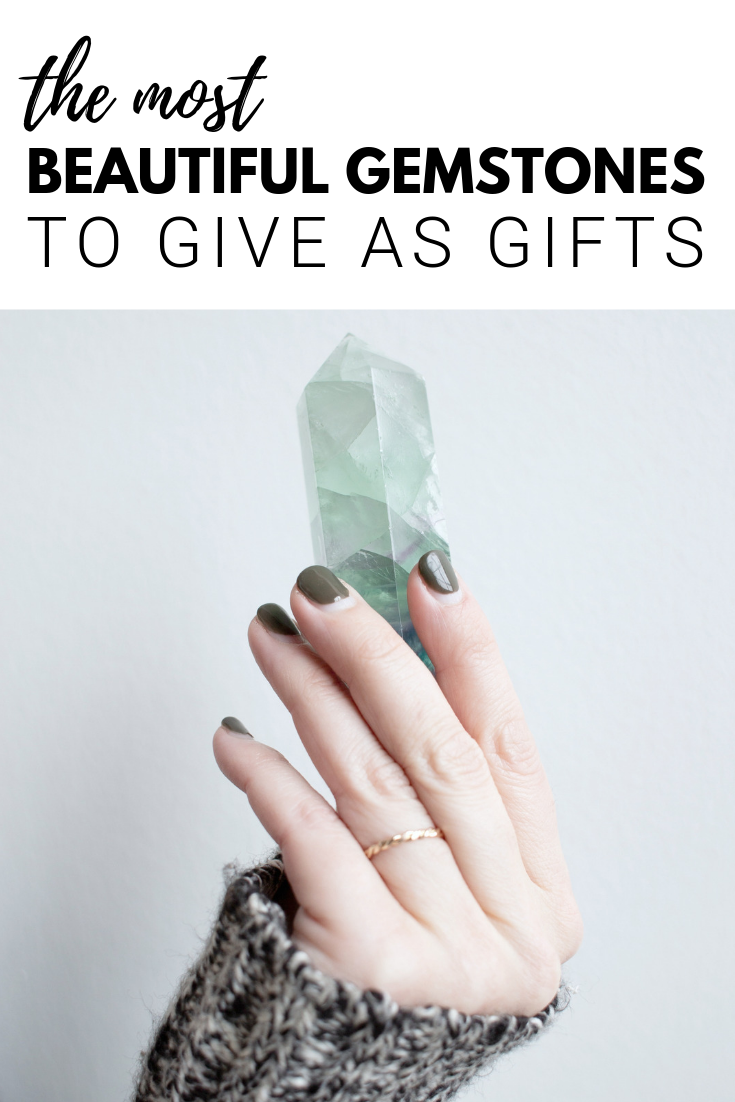 A banner reads, "the most beautiful gemstones to give as gifts", with a picture of a hand holding a beautiful gemstone. 