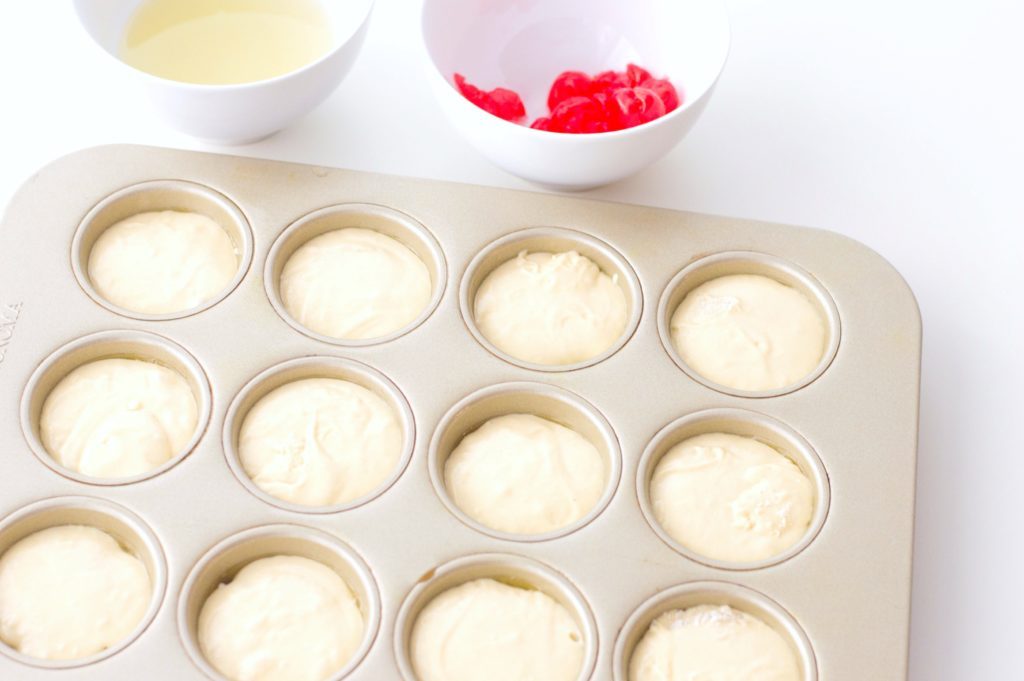 Batter is poured on top of pineapple, brown sugar, and cherry mixture. 