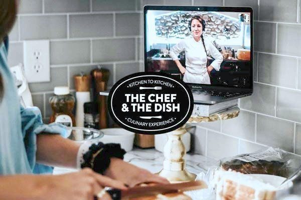 A person cooks and a video is seen behind him with a chef giving guidance. 