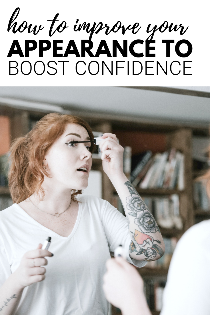 A banner reads, "how to improve your appearance to boost confidence." Woman puts on mascara in a mirror.