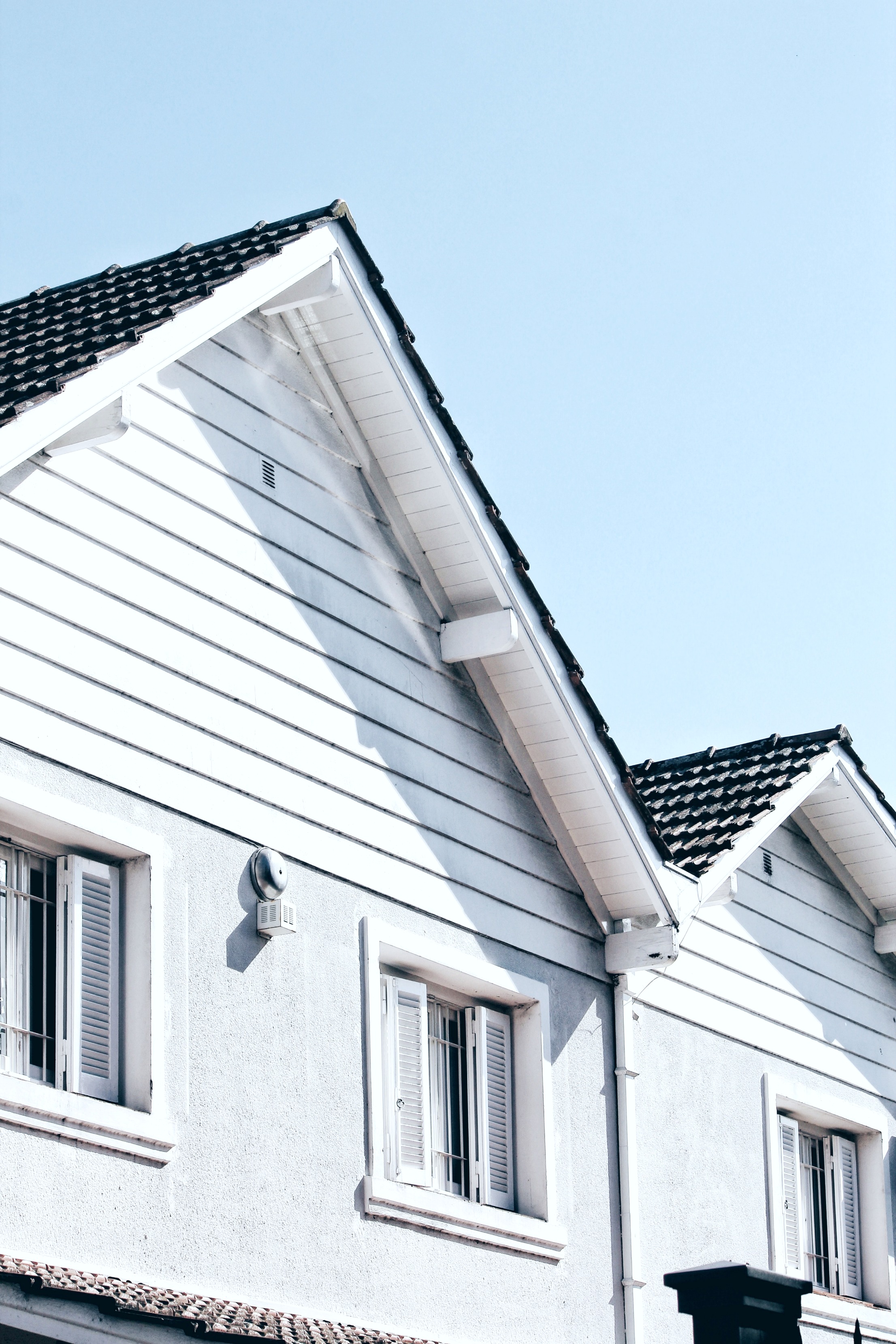 Two roof peaks of a beautiful home. 