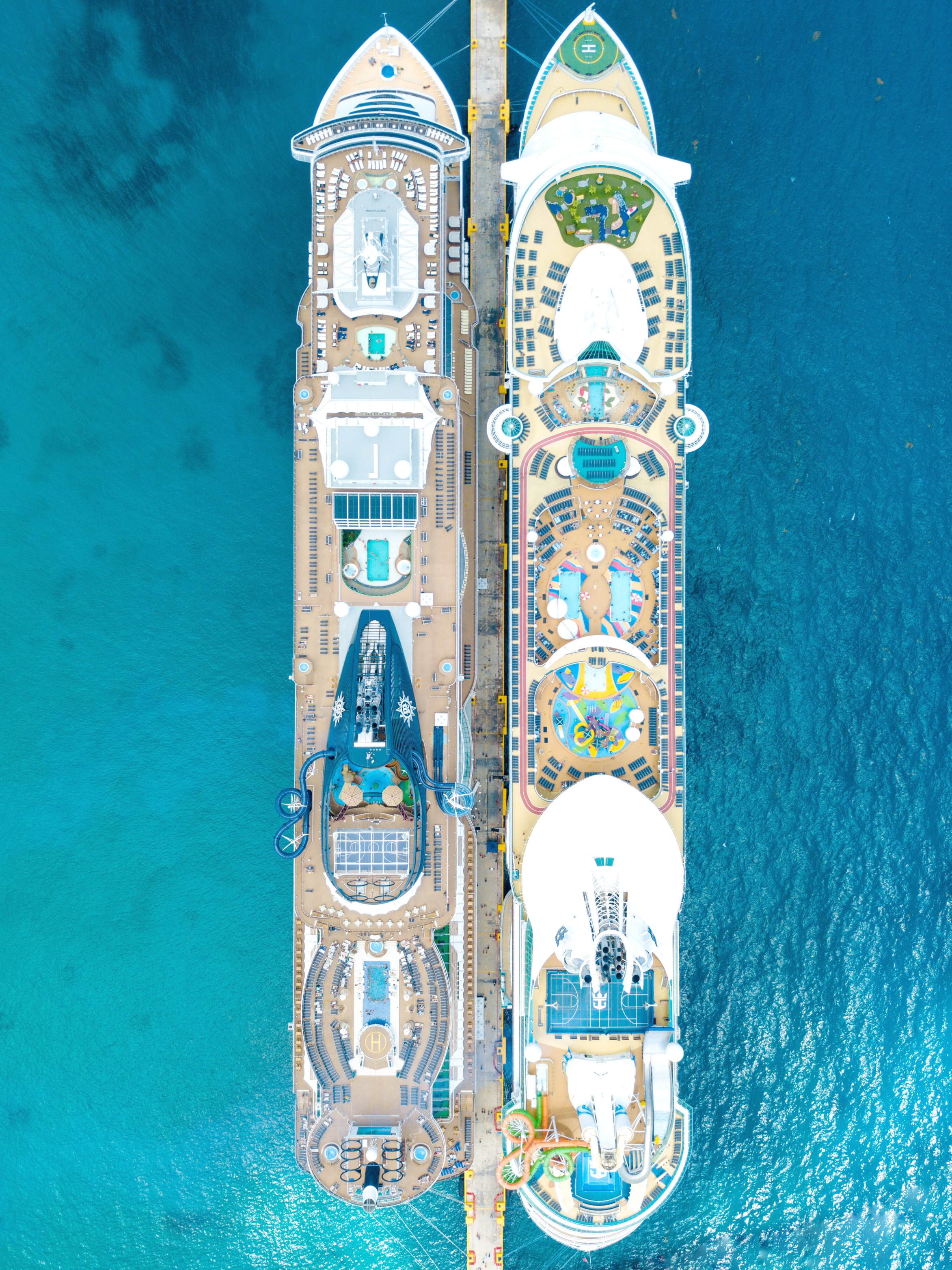 A bird's eye view of cruise ships at a port. 