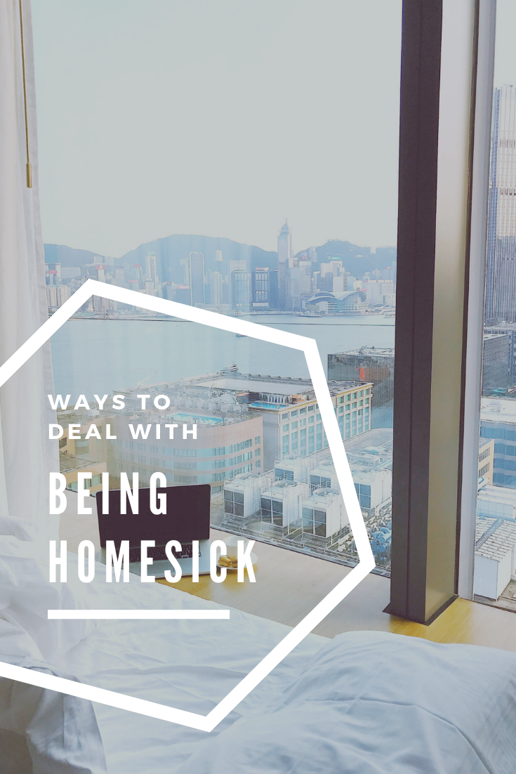 A banner reads, "ways to deal with being homesick," and shows a picture of an empty bed overlooking a city from a hotel window. 