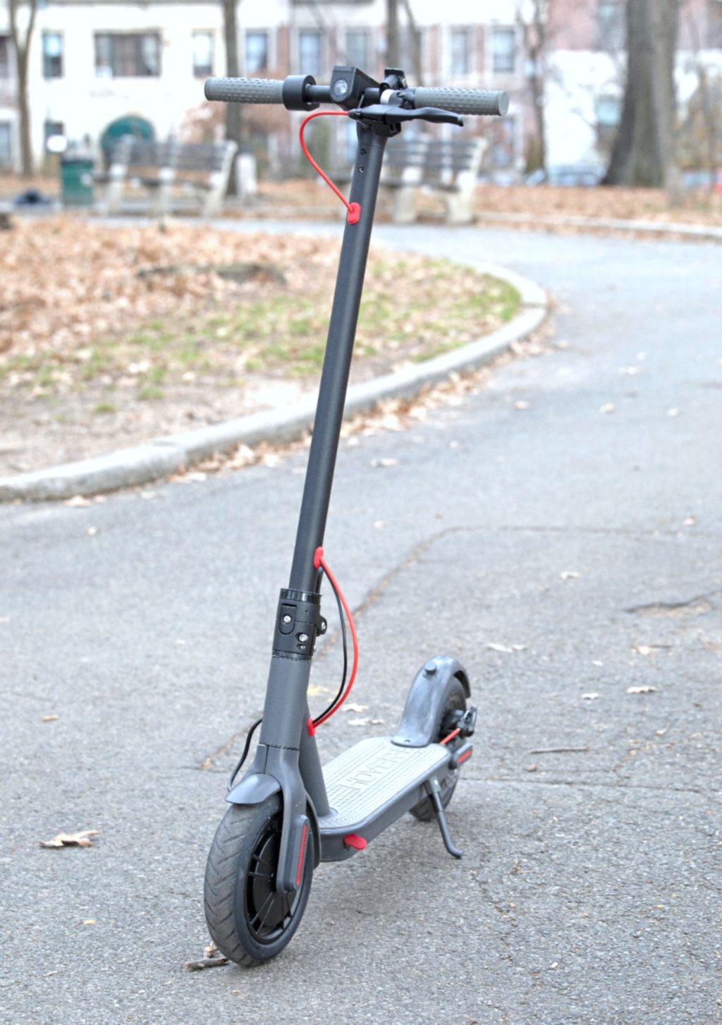 The Hover-1 Journey Scooter on a street waiting to be ridden. 