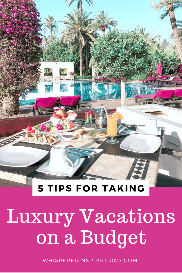 A luxury hotel pool with a table filled with food. A banner below it reads, "5 tips for taking luxury vacations on a budget.'