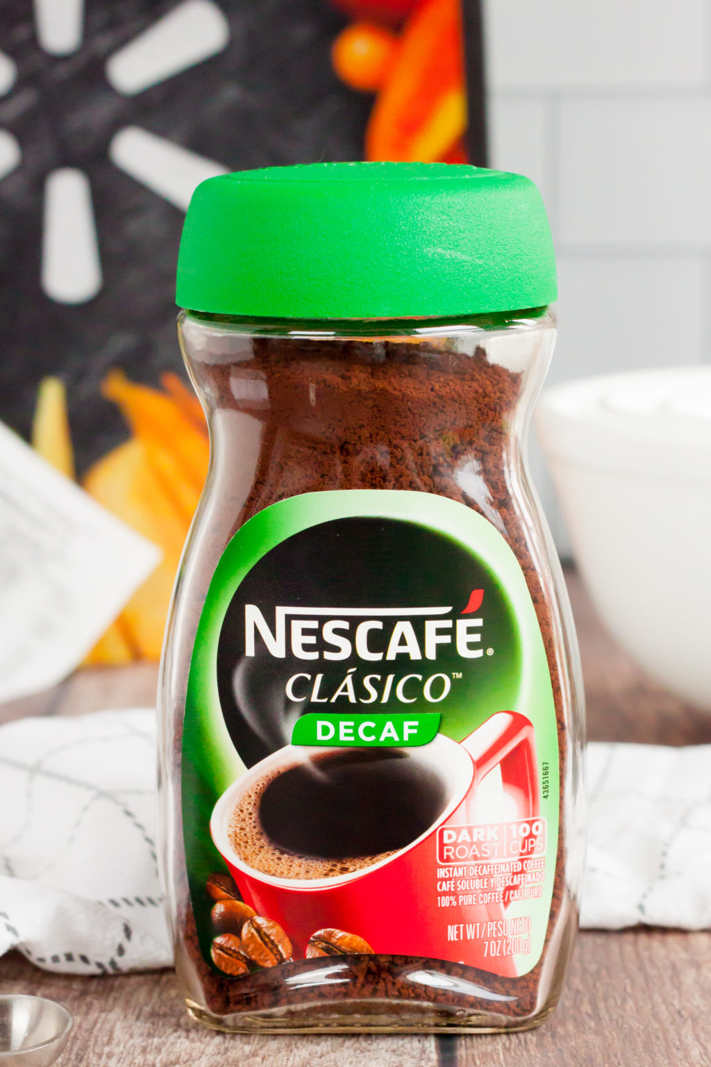 Close up of Nescafe Clasico coffee, Walmart bag and receipt are in the back.