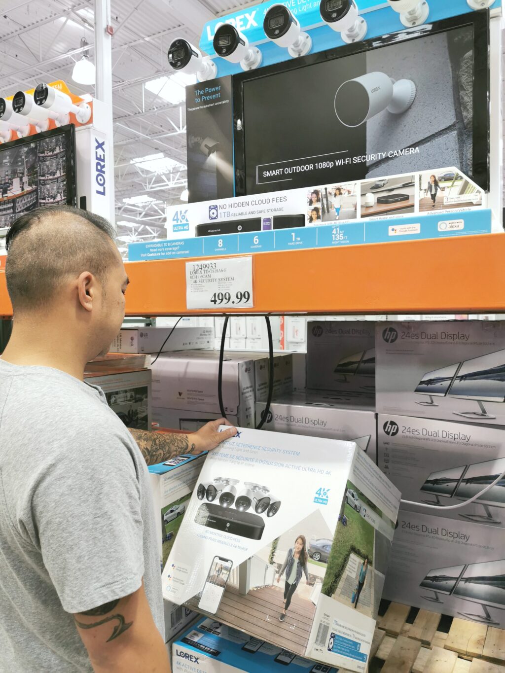 Darasak looks at the security cameras at Costco.