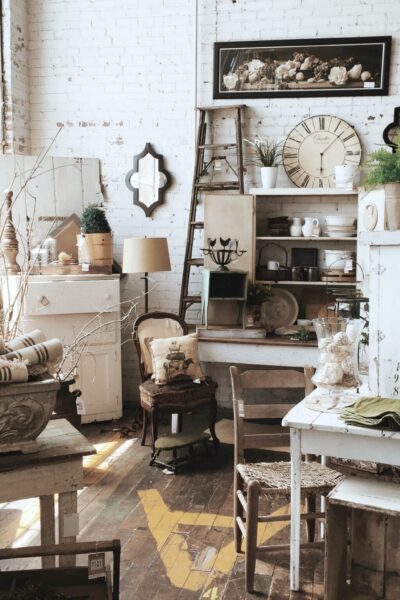 A room full of gorgeous antiques and antique furniture.