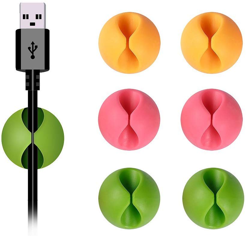 Cable grips in pink, green, and yellow. 