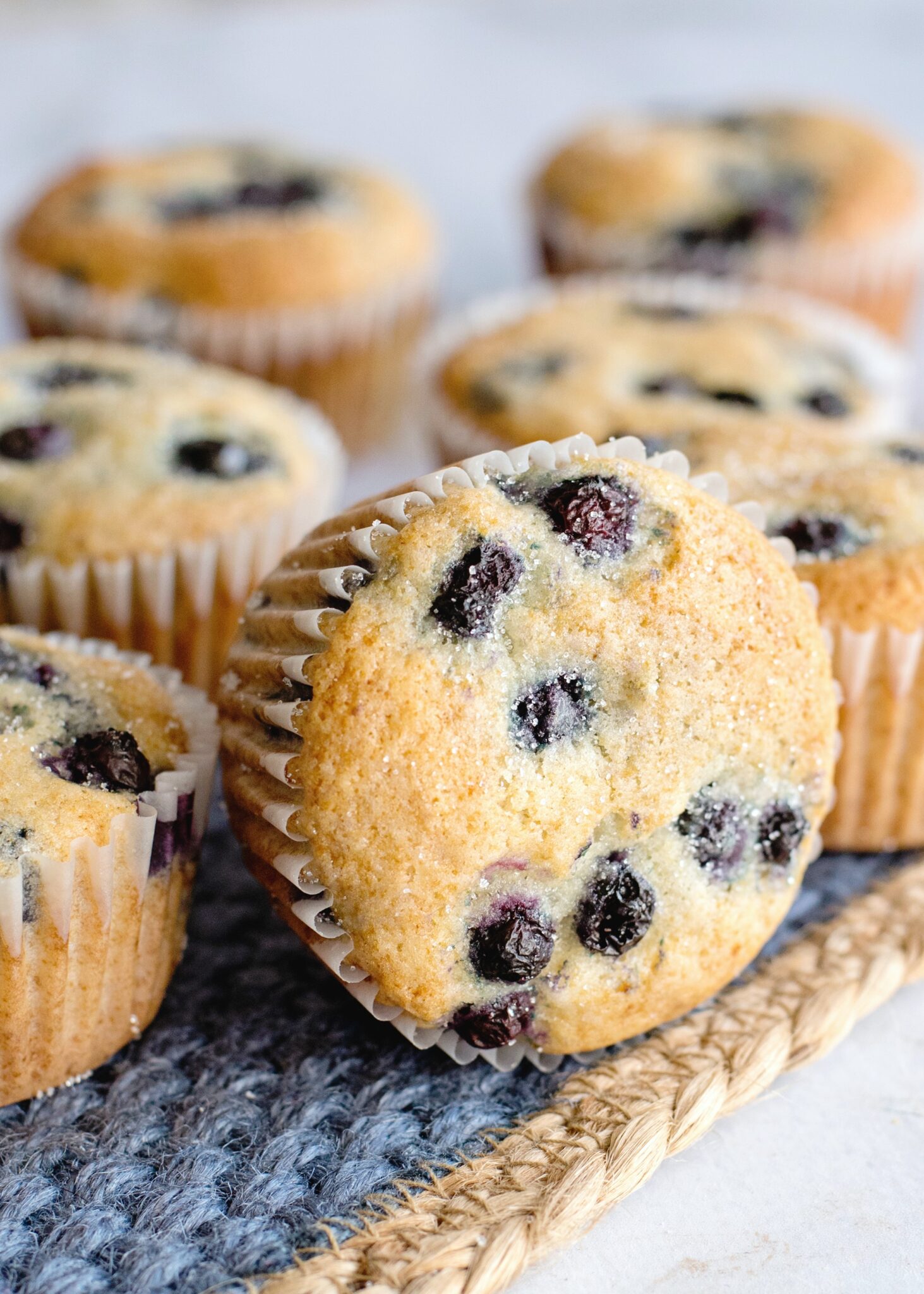 Blueberry Pancake Muffins up close, one is laying on its side.