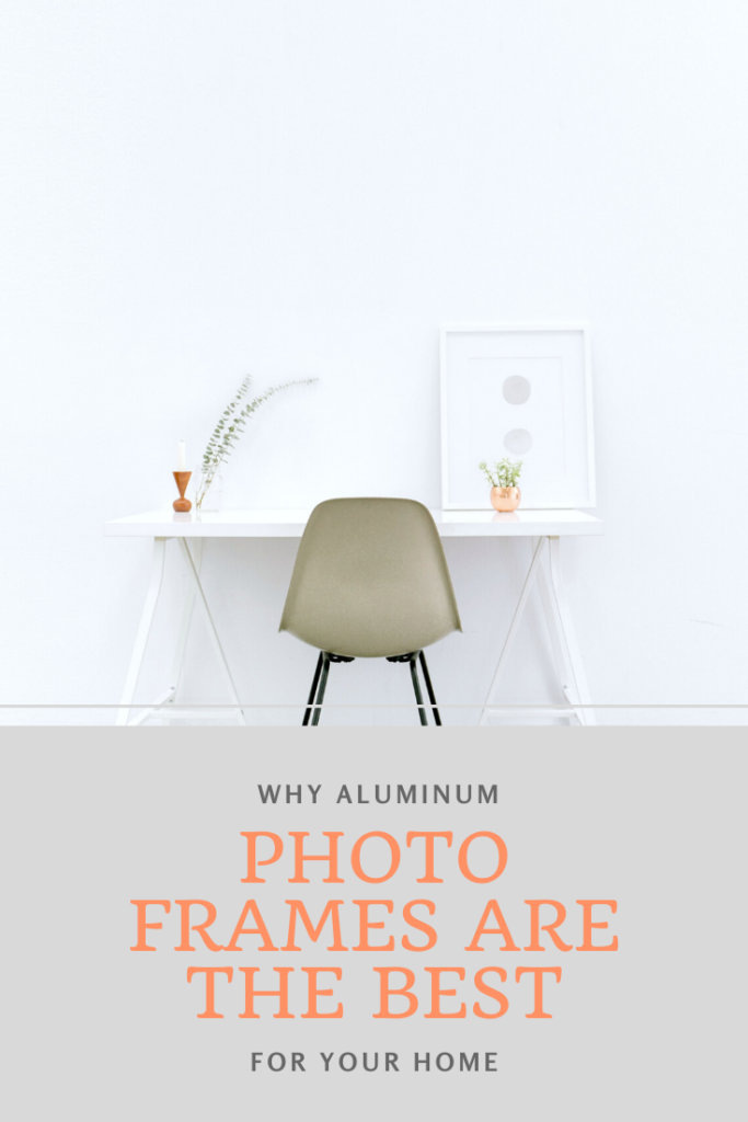 A white room with a white desk, a brown chair, and aluminium frame on top of desk. A banner reads, "Why aluminum photo frames are the best for your home."