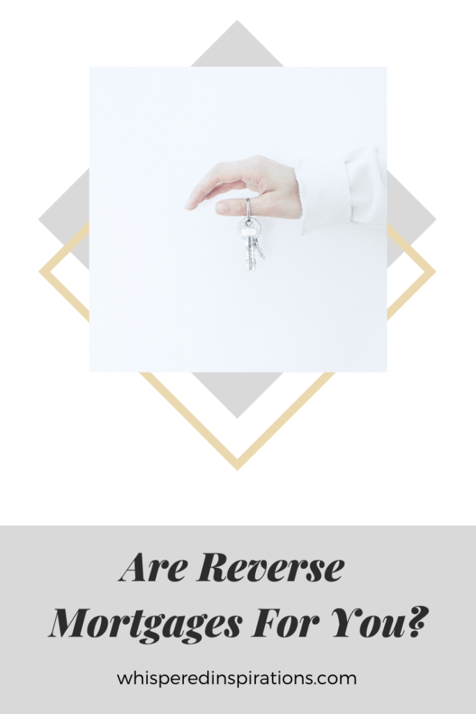 A person's arm and hand are against a white wall and holds a key for a home. A banner below reads, "Are Reverse Mortgages for You?"