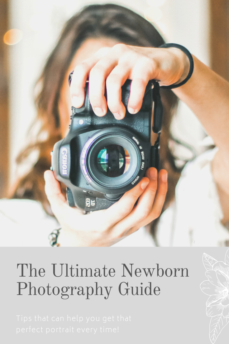 Woman holding camera and pointing it to the photographer. A banner reads, the Ultimate Newborn Photography Guide.