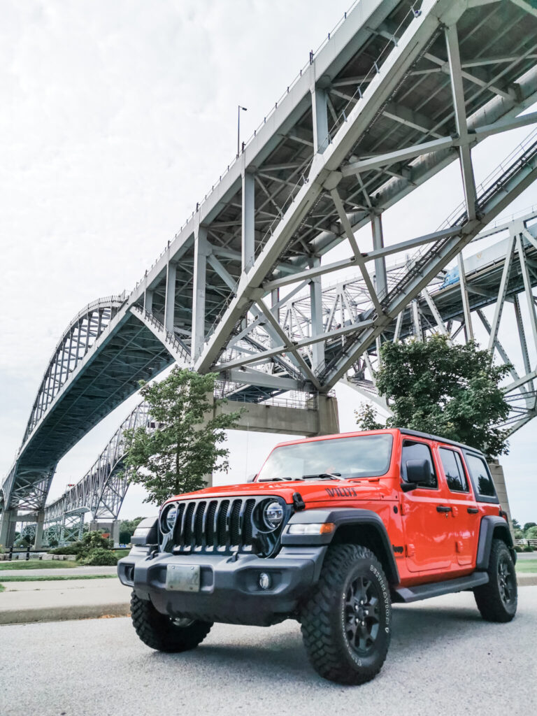 A 2020 Jeep Wrangler is parked under the Bluewater Bridge in Sarnia, ON.