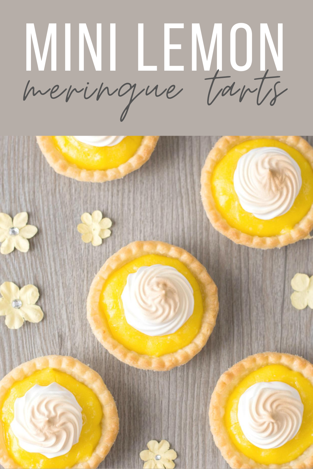 A banner reads, "Mini Lemon Meringue Tarts,"  a picture below is a a flat lay picture of the tarts on a grey board.