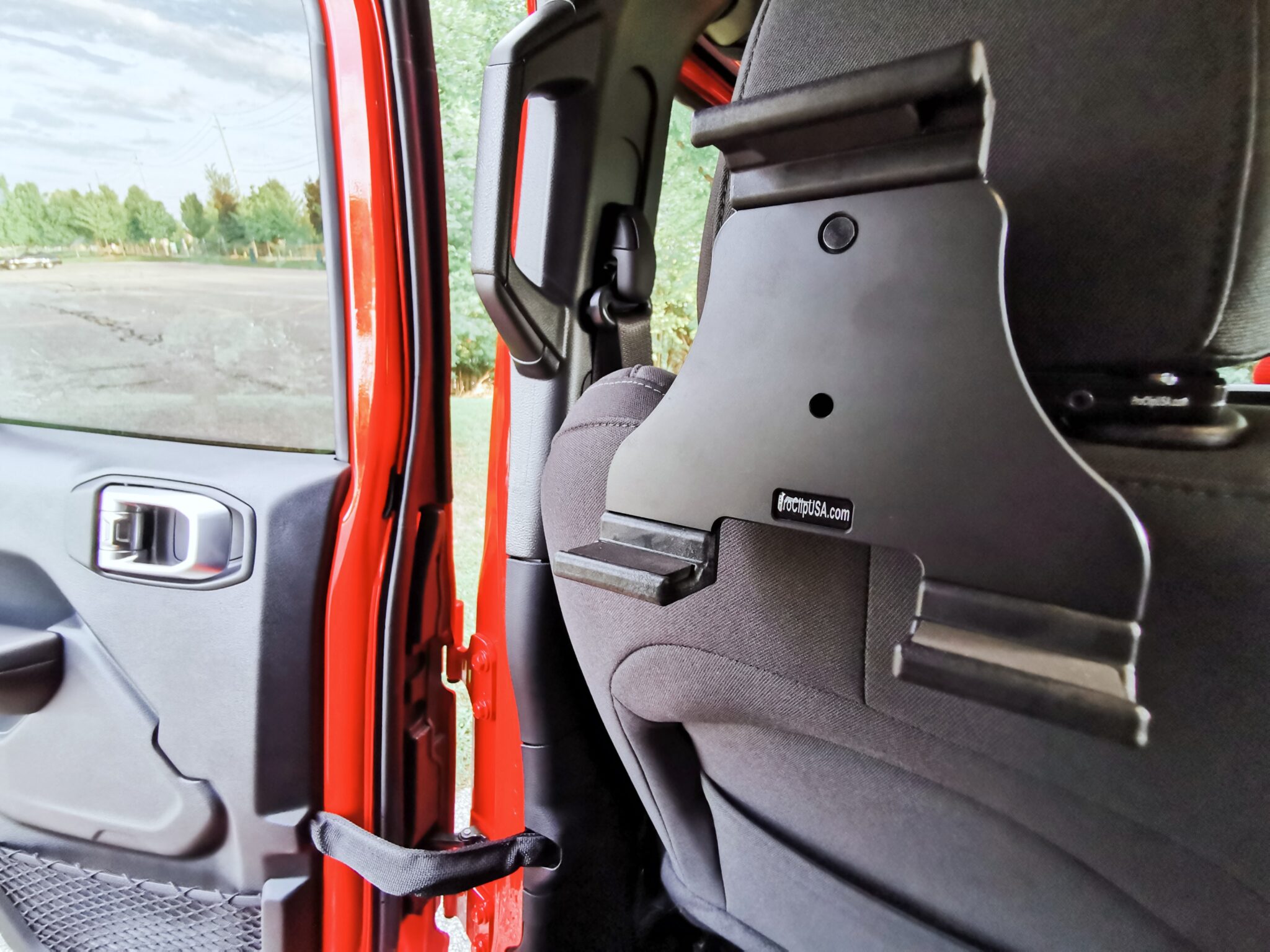 A close up of the ProClip iPad Headrest Mount for a 2020 Jeep Wrangler. 