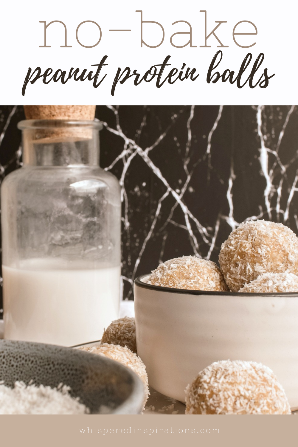 A cutting board with a plate on top that is filled with peanut protein balls. It rests on a napkin with a glass canister of milk with a cork top. Peanuts, a bowl of coconut, and a peanut butter jar. A banner reads, "No-Bake Peanut Protein Balls."