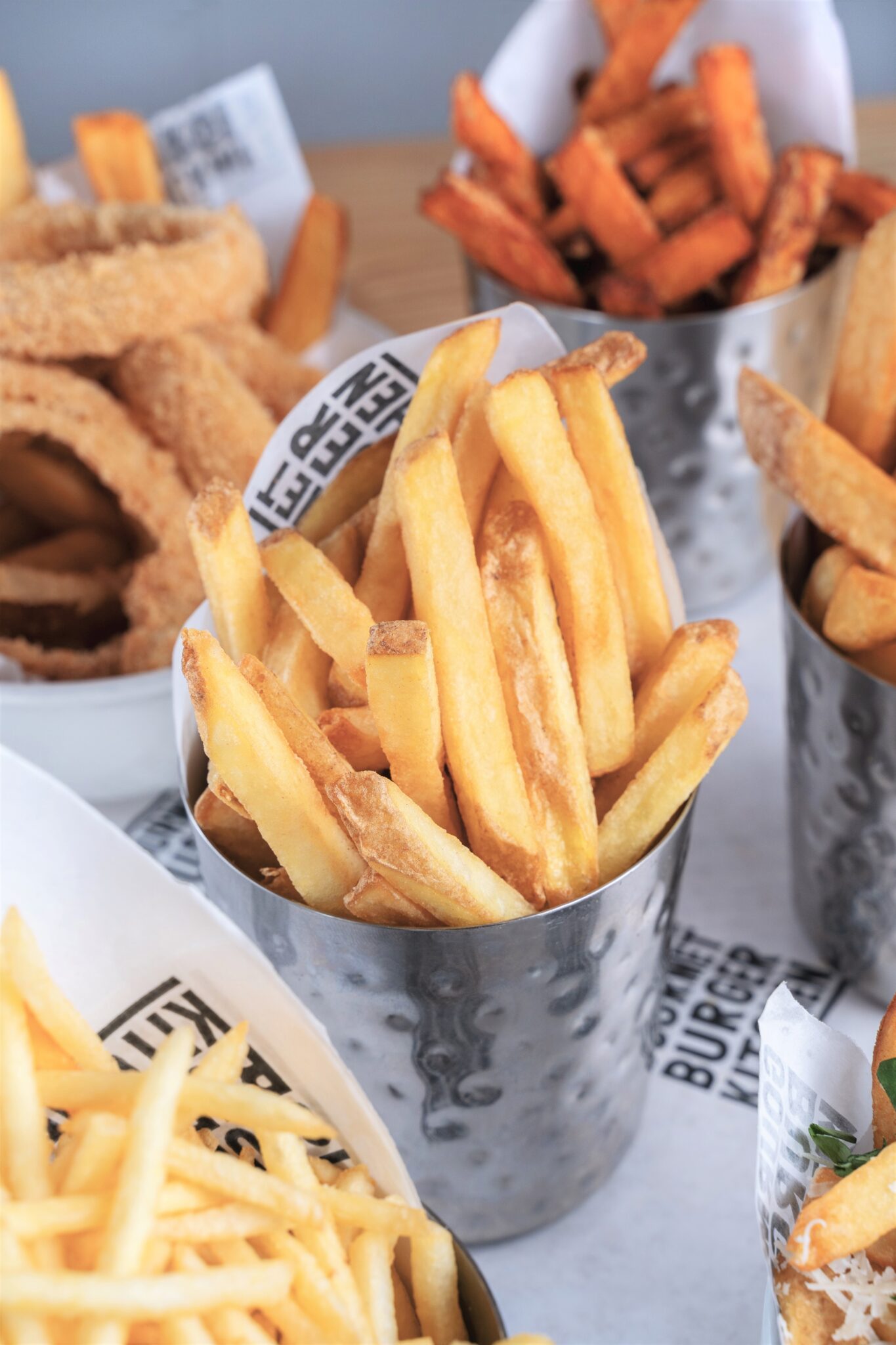 Different types of fries and onion rings are in individual portions. This article covers fan favorite apps in under 30 minutes.