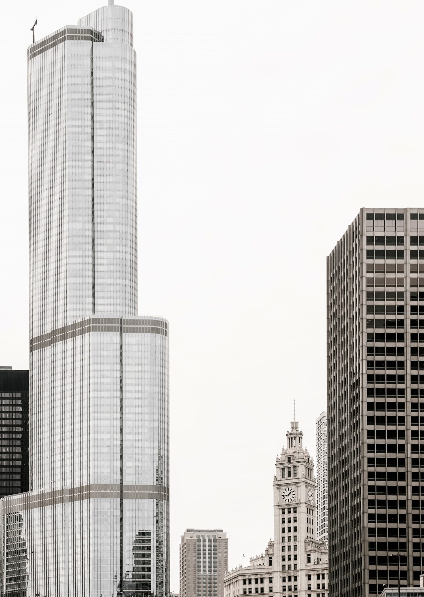 High-rise buildings in Chicago. In between is an old-school building. This article covers must-include items in your Midwest travel bucket list.