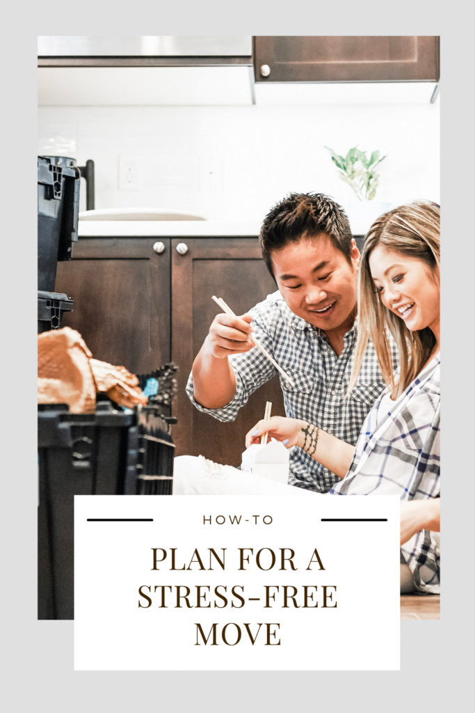 Asian couple sitting on their kitchen floor eating takeout as they unpack in their new home. This article covers tips to plan for a stress-free move.