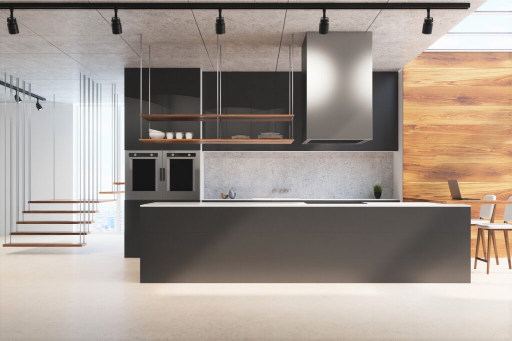 A silver and black kitchen with wooden interior. This article covers Kitchen Trends to Look For in 2022.