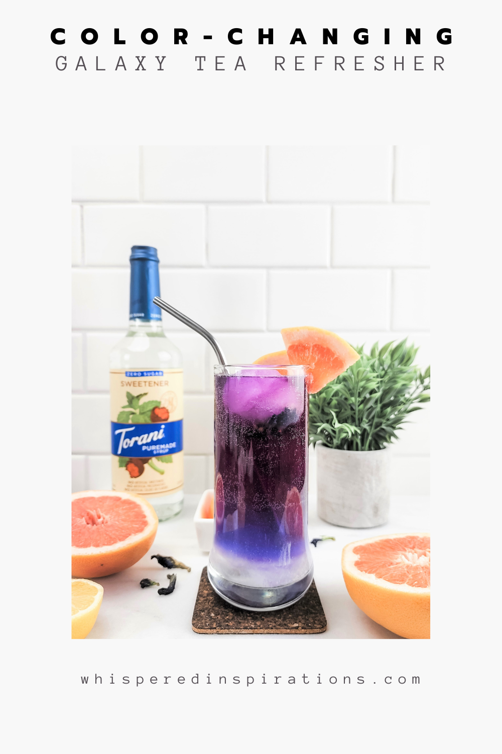 A tall glass shows a glittering drink that is layered and ombre. It is white on the bottom, then purple, then red. It's a color changing Hibiscus Tea Galaxy Refresher.