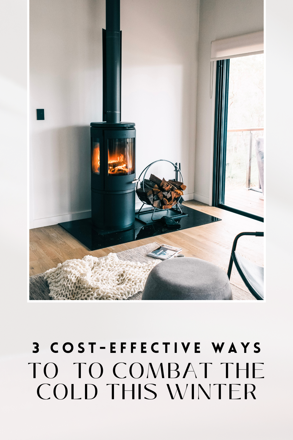 A beautiful living room is shown, it's cozy with a fireplace and plenty of blankets and a rug. This article covers 3 cost-effective ways to combat the cold this winter.
