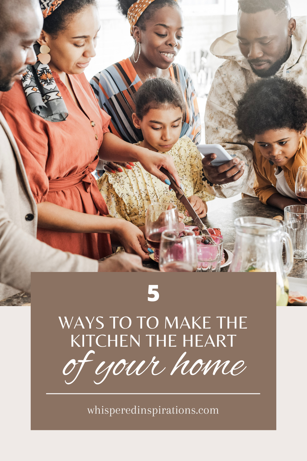 A family gathers around the kitchen cutting a cake. They are huddled around smiling and taking pictures. This article covers how to make the kitchen the heart of your home.