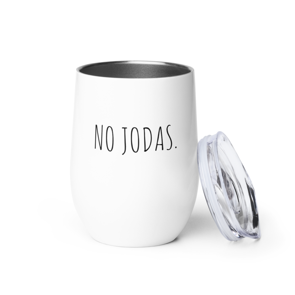 A white wine tumbler that says, "No Jodas' is shown. It's an item from Whispered Inspirations Etsy Shop. 