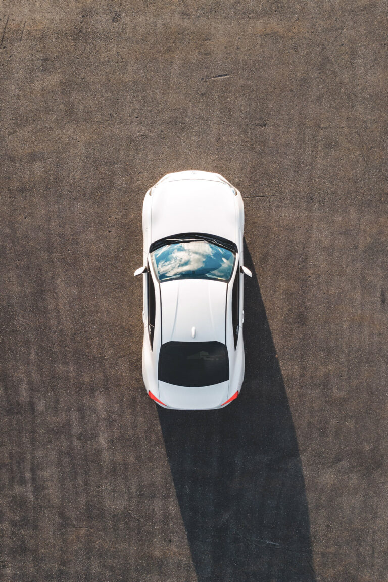 Birds eye view of a Toyota Corolla, in a parking lot. This article covers the top 7 cars you should consider.