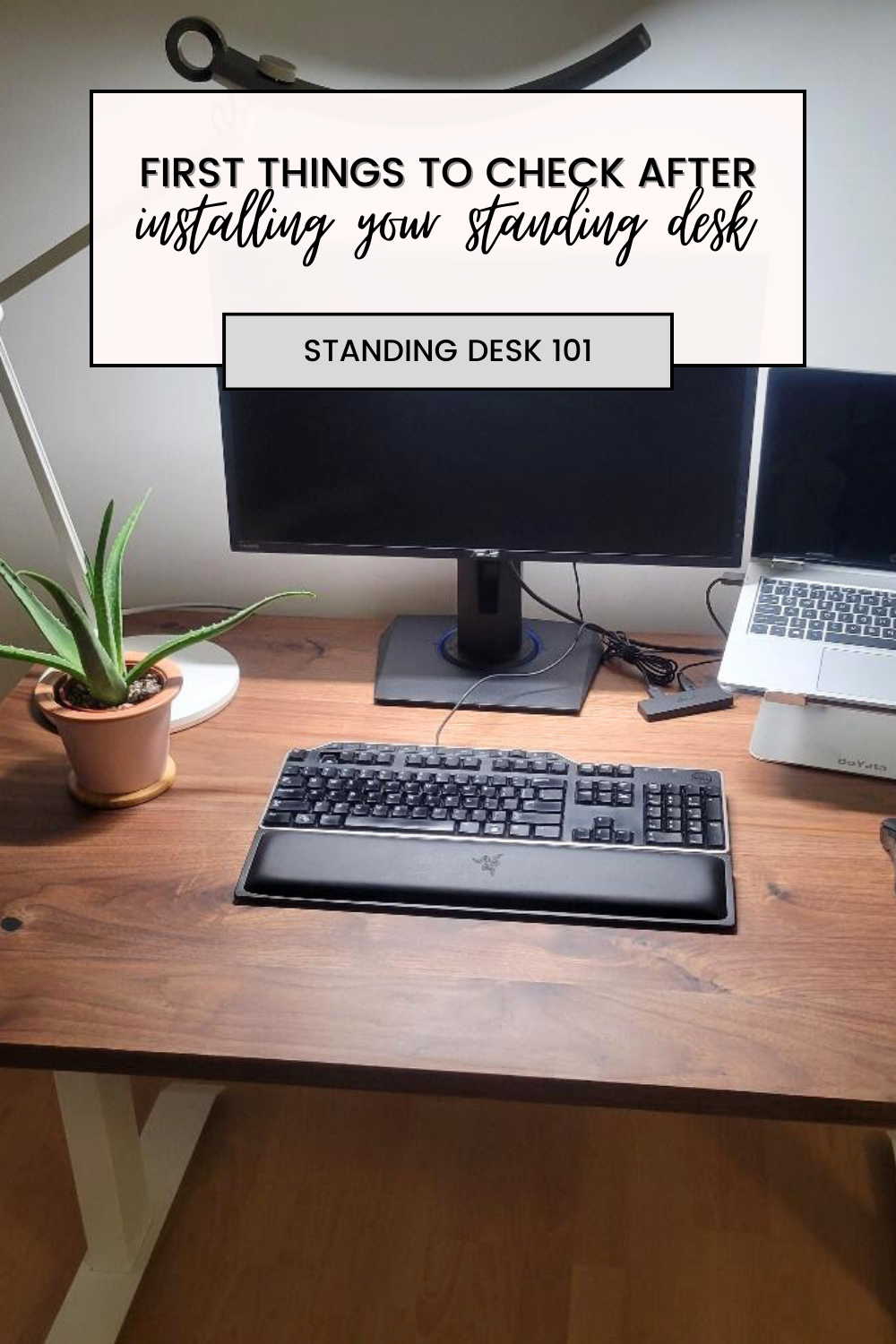 A standing desk set up is shown. This article covers the first things to check after installing your standing desk.