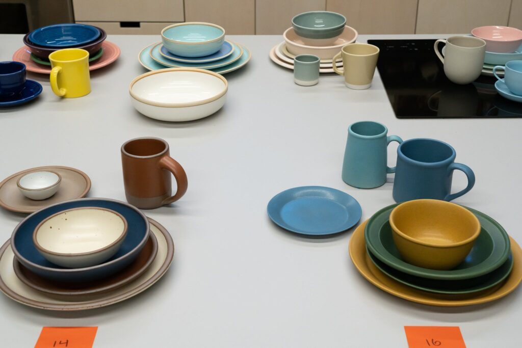 Modern style of dishes in all shades of color. This article covers how to style photos for modern living spaces.