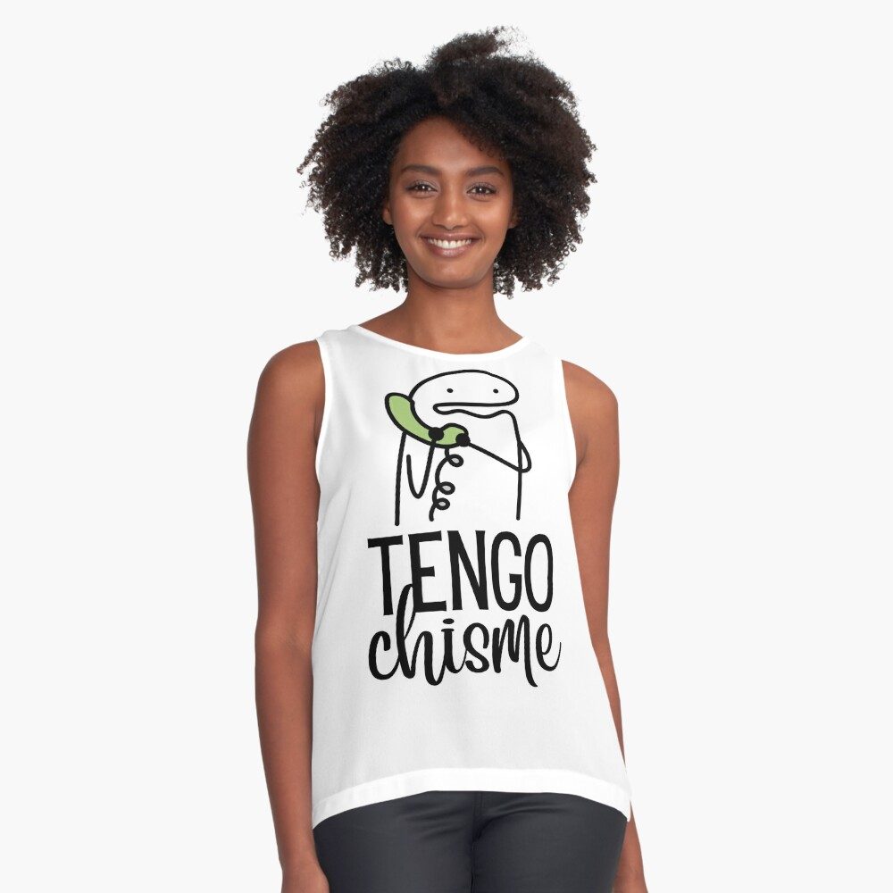 Woman wears a shirt from Whispered Inspirations Shop. It says, 'Tengo Chisme', which means I have gossip.