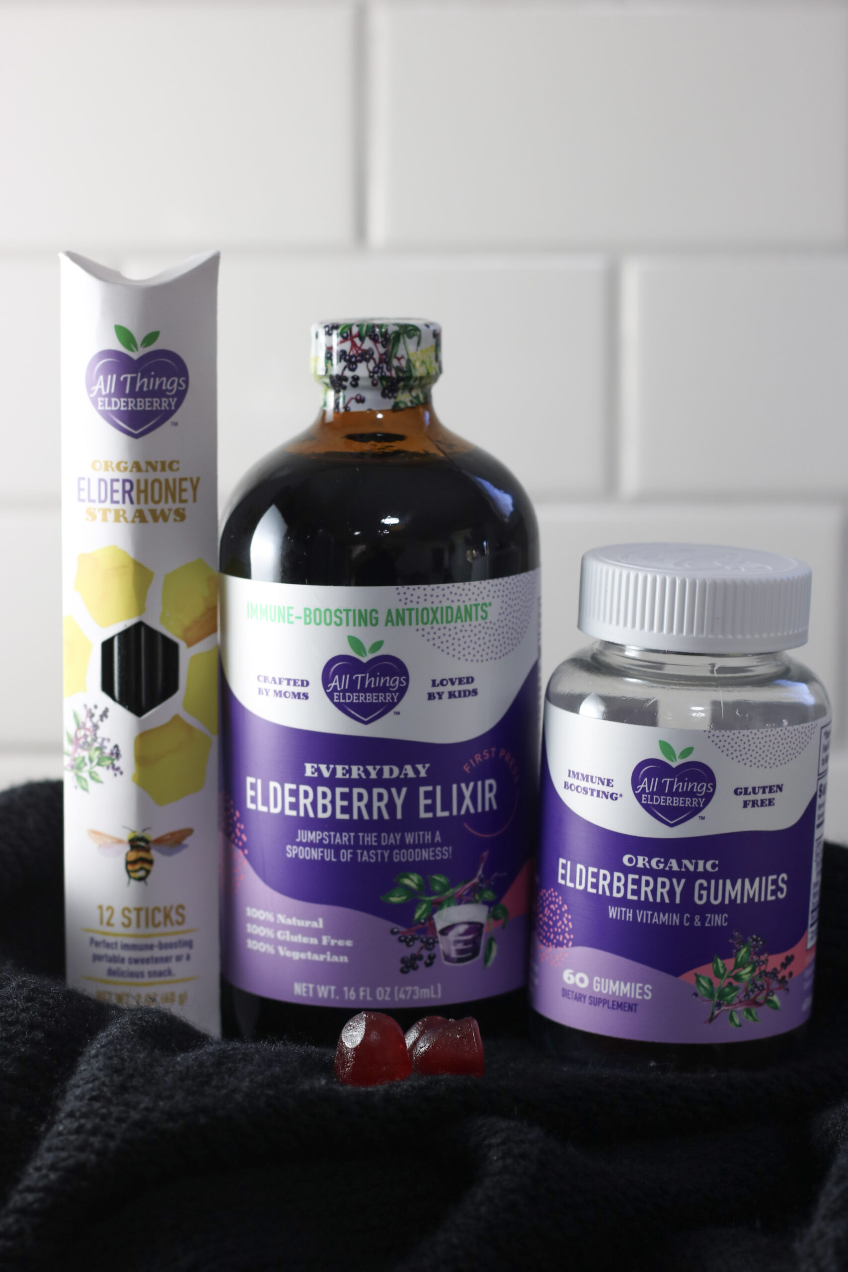 Honey straws, elixir, and gummies are shown. This article covers All Things Elderberry and the products they offer.