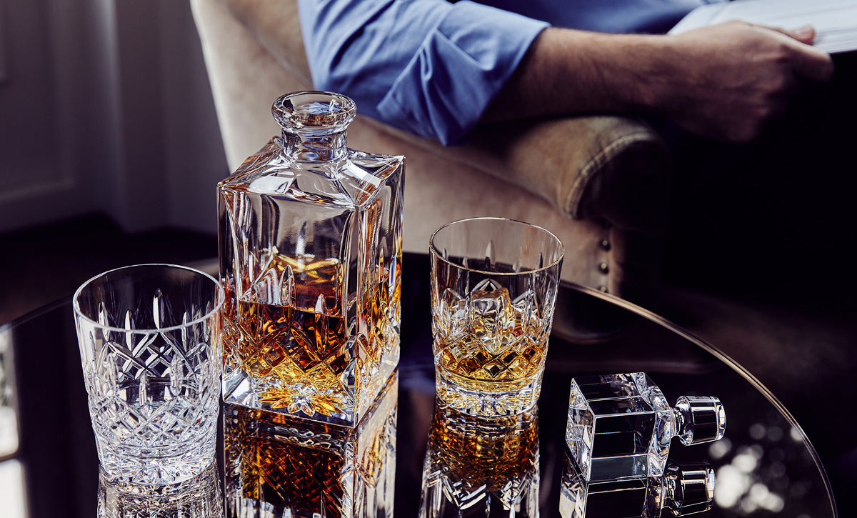 A set of Waterford Crystal being displayed with spirits. This article covers why they remain highly coveted today.