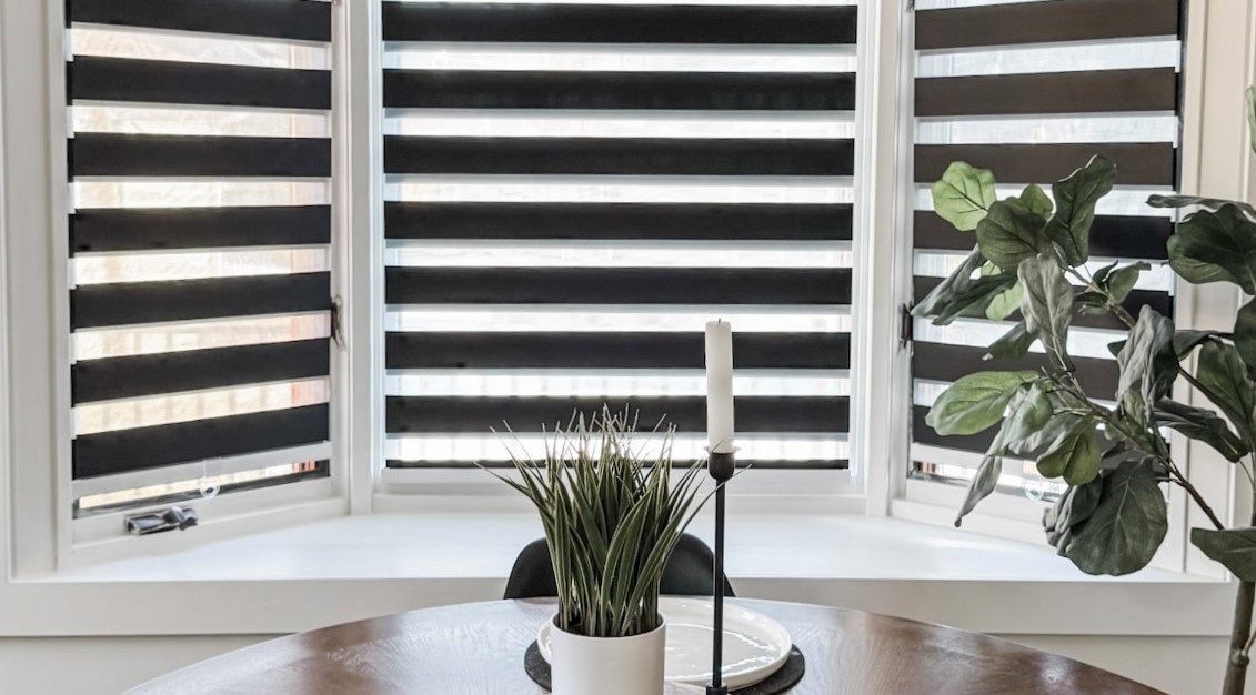 A close up of LUSTROWIN Black Zebra Blinds.