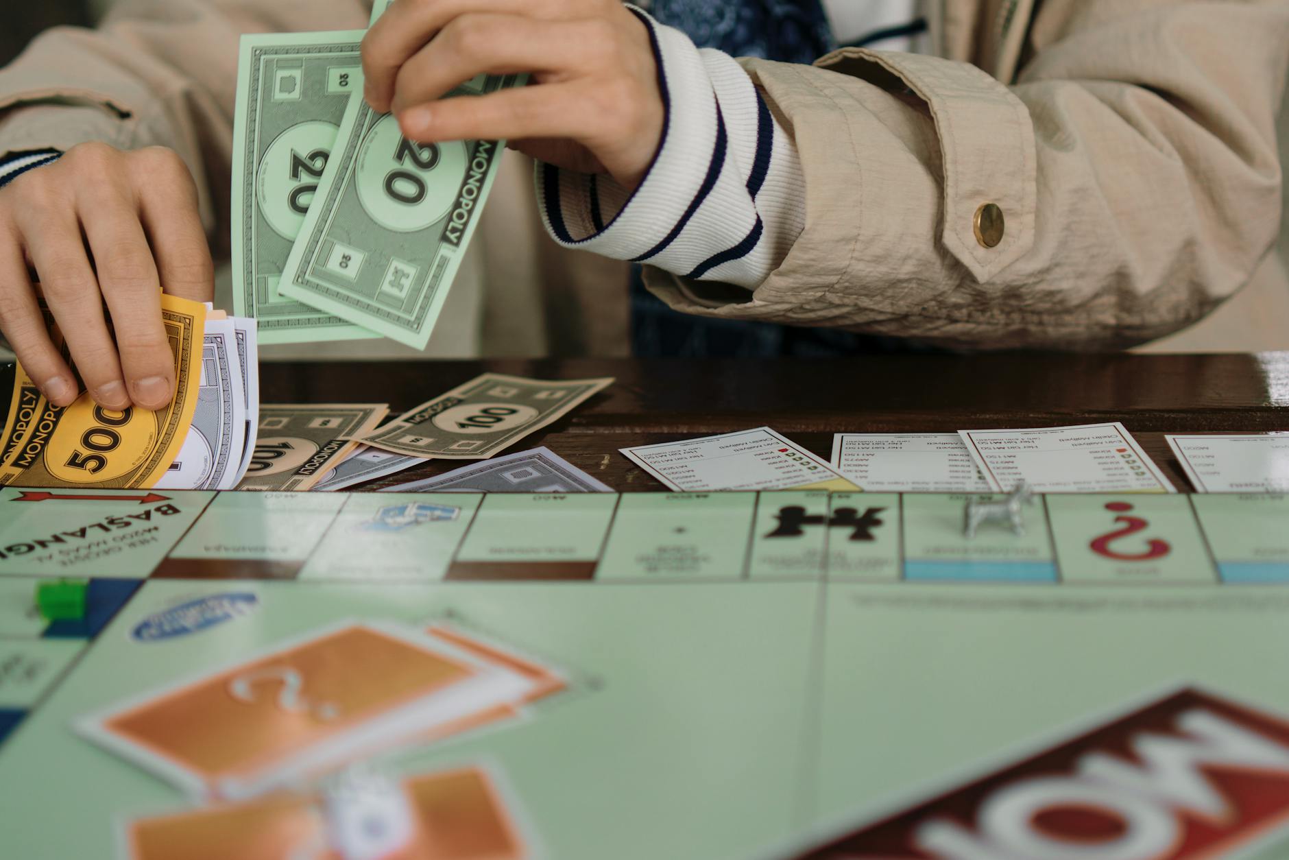 playing board game with monopoly money