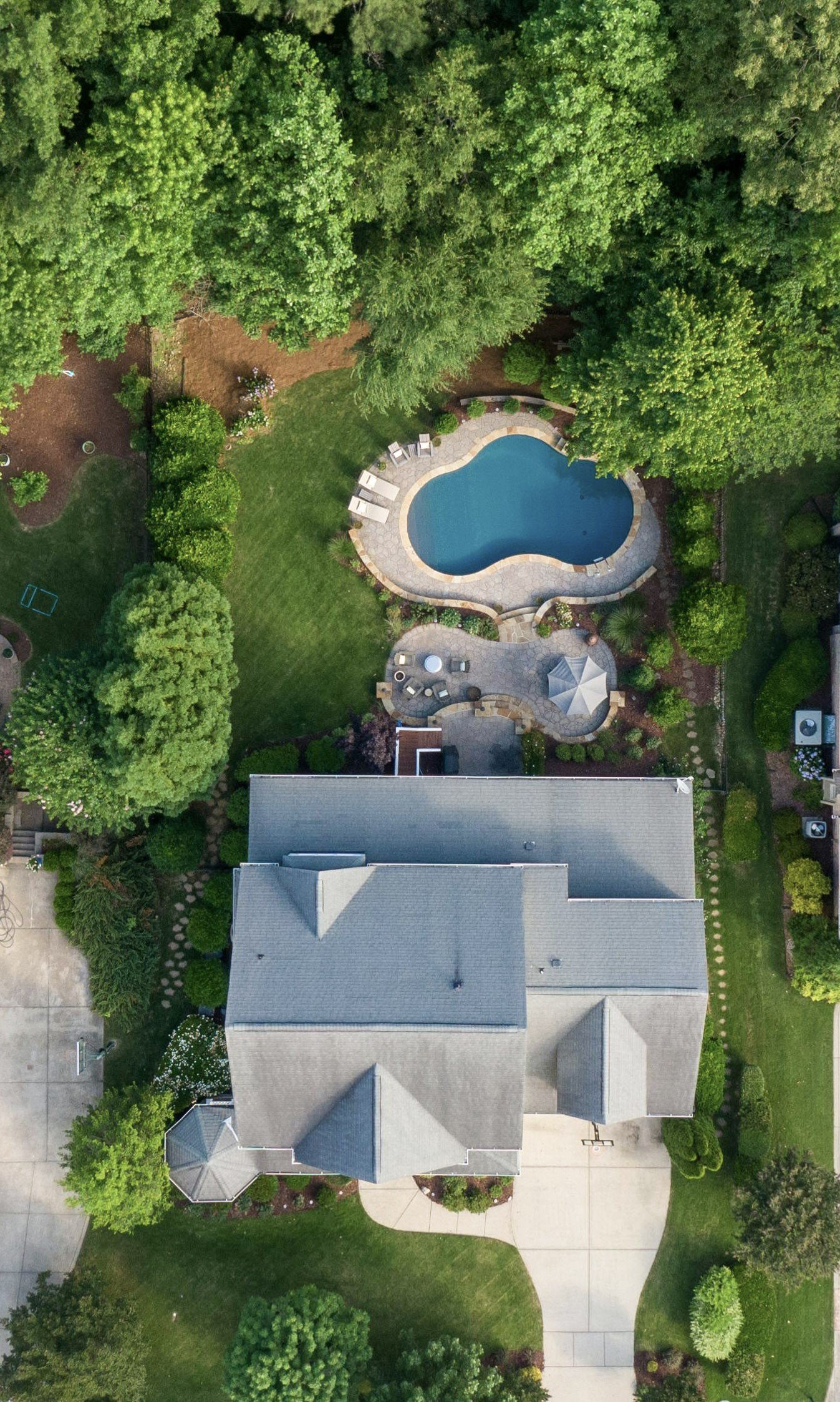 Birds Eye View of a home in a neighborhood. This article covers the smartest home upgrades for lasting value.